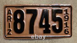 1916 Arizona license plate 8745 black on copper embossed