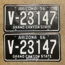 1956 Arizona license plate pair V-23147 white on black embossed 1957 1958