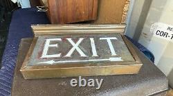 Antique Copper Exit Sign with White Letters Old Movie Theater