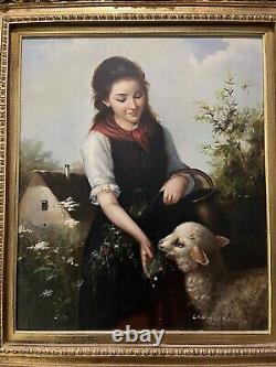 Antique old painting of girl feeding a lamb. Signed Landseer Beautiful Painting