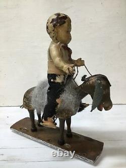 OLD BOY ON DONKEY PULL TOY C. 1940s-SILVER DIMES FOR WHEELS