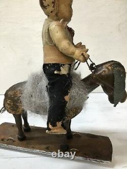 OLD BOY ON DONKEY PULL TOY C. 1940s-SILVER DIMES FOR WHEELS