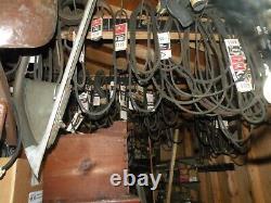 Old Gates Automotive belts wood racks and 150+ antique belts