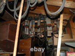 Old Gates Automotive belts wood racks and 150+ antique belts