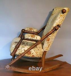 Old Hunzinger rocking chair High Style Victorian walnut / we can have delivered