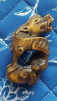 Old Japanese Netsuke Dragon. Signed Tamaishi