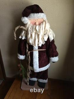 Primitive Handmade Old Thyme Santa with Faux Wool Coat Candy Cane Rusty Bells Pine