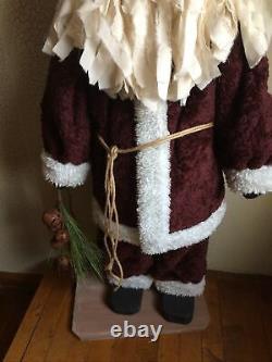 Primitive Handmade Old Thyme Santa with Faux Wool Coat Candy Cane Rusty Bells Pine