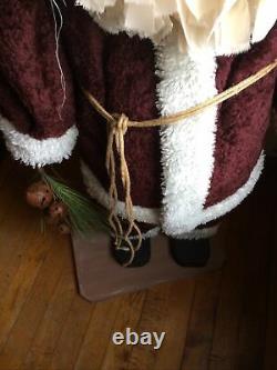 Primitive Handmade Old Thyme Santa with Faux Wool Coat Candy Cane Rusty Bells Pine