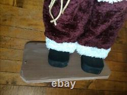 Primitive Handmade Old Thyme Santa with Faux Wool Coat Candy Cane Rusty Bells Pine