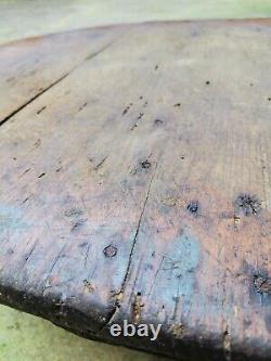 Primitive old antique wooden round table