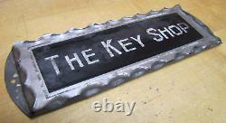 THE KEY SHOP Antique Reverse on Chip Scalloped Glass Advertising Sign ROG