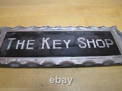 THE KEY SHOP Antique Reverse on Chip Scalloped Glass Advertising Sign ROG