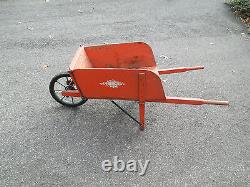 Wooden wheelbarrow antique vtg wheel barrow orange old paint