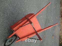 Wooden wheelbarrow antique vtg wheel barrow orange old paint